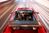 tesla-roadster-red-blurred